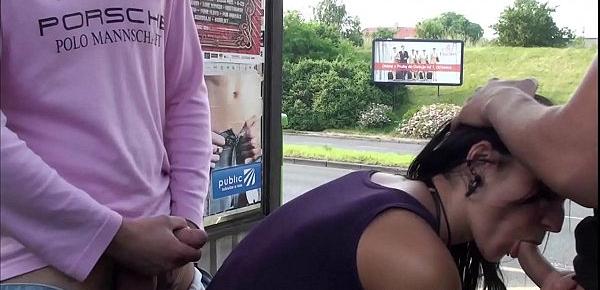 A pretty girl with big natural tits in public street threesome with high traffic